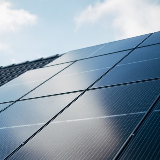 A close up of a solar panel on a building